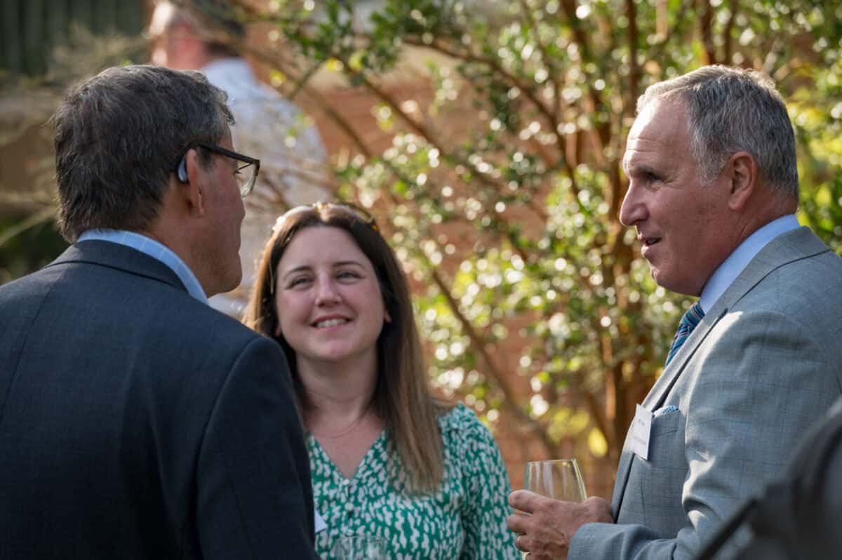 Professional corporate photographers capturing business networking events in outdoor settings | Expert corporate photography UK.