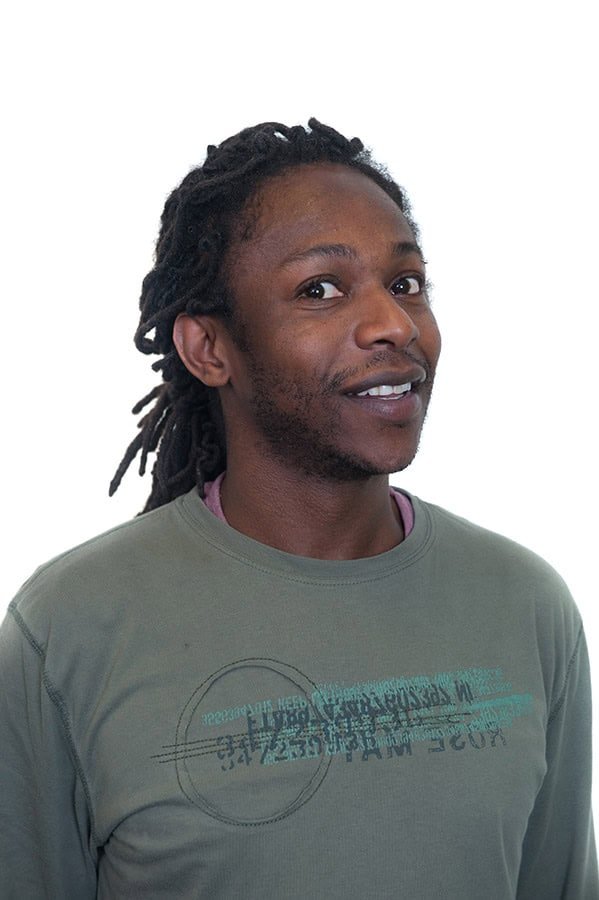 Professional corporate portrait of a confident business person in casual attire for professional branding.