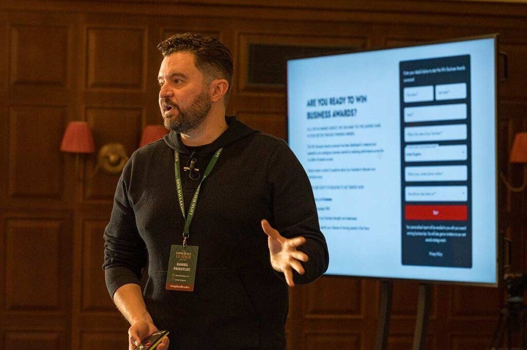 High-quality corporate photographer capturing presentation at business conference in UK.