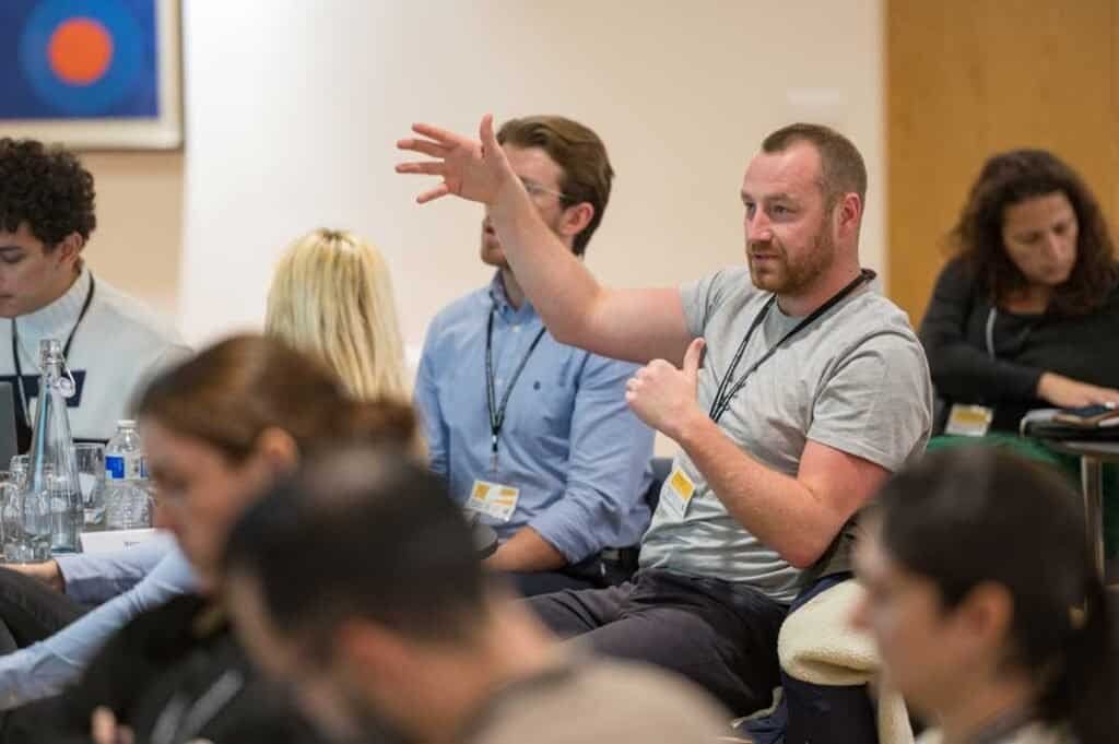 Corporate photographer capturing a business conference in Cambridge.